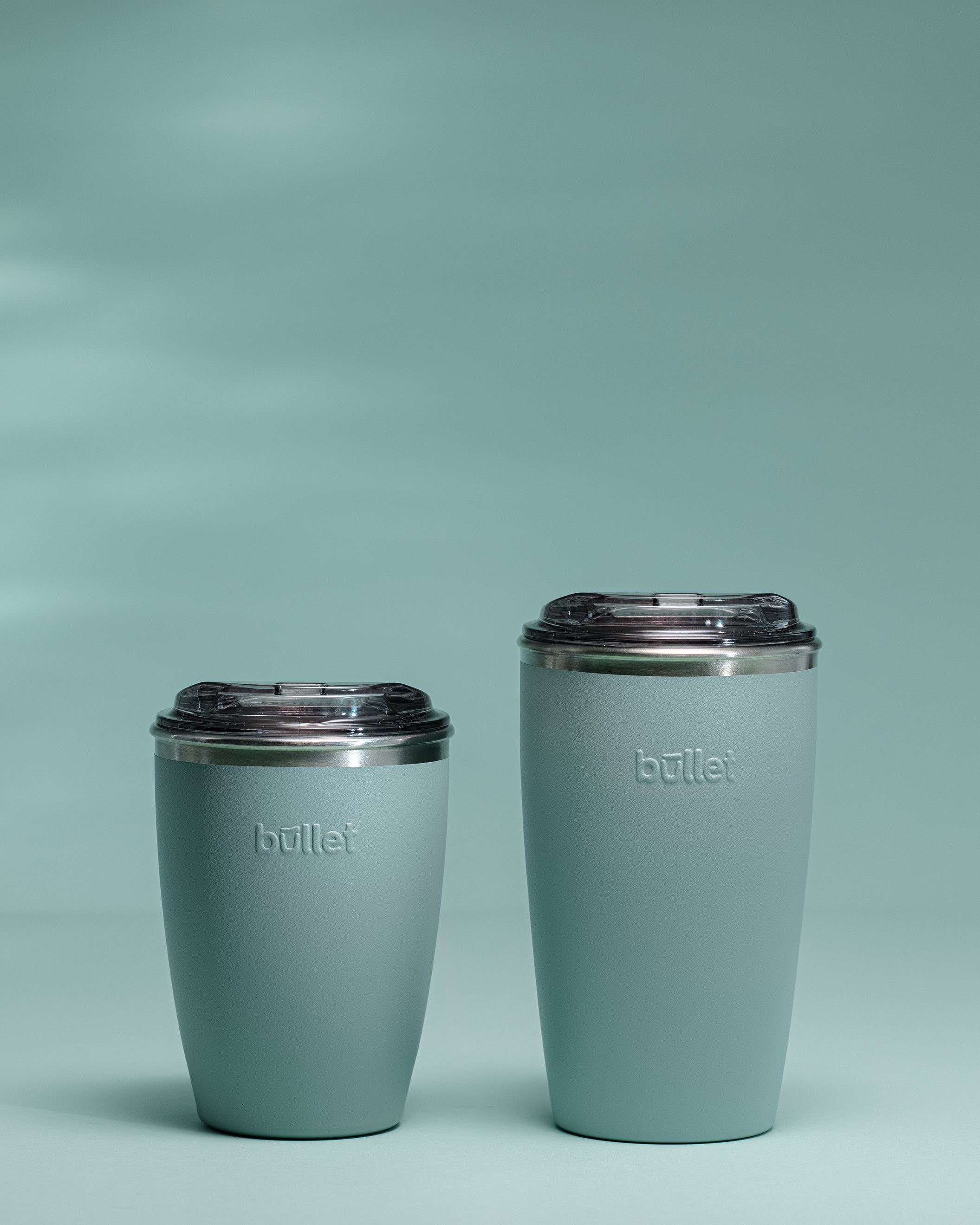 side by side comparison of an 8oz and 12oz green bullet cup